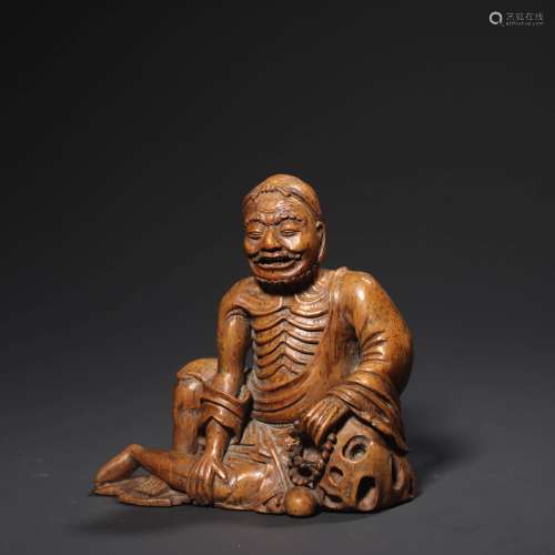 A Bamboo Carved Seated Bodhidharma Statue
