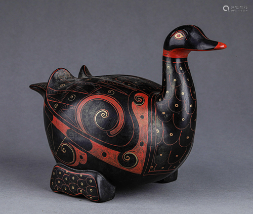 A CHINESE VINTAGE LACQUER DUCK FIGURINE