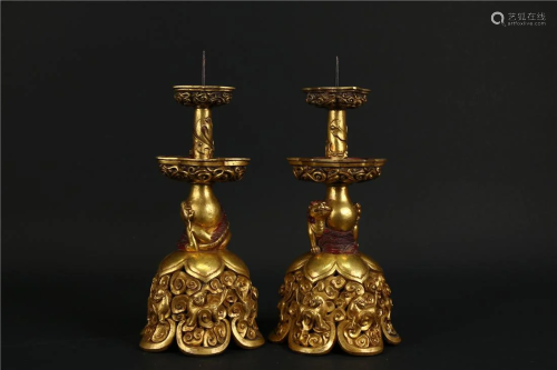 A PAIR OF GILT IMPERIAL BRONZE CANDLESTICKS