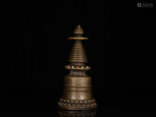 A BRONZE TIBETAN BUDDHIST TOWER