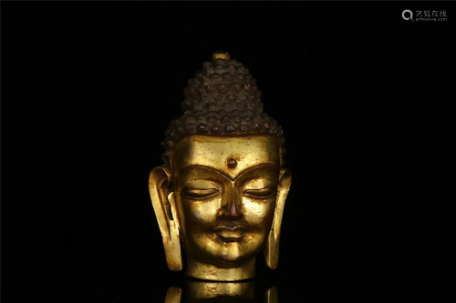 A GILT BRONZE BUDDHA HEAD