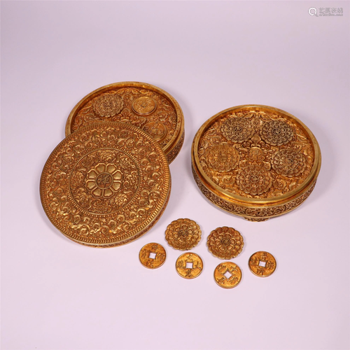 A GILT BRONZE BOX AND COINS