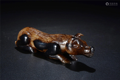 A JADE DOG FIGURINE