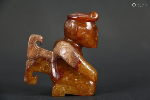 A HETIAN JADE HUMAN FIGURINE