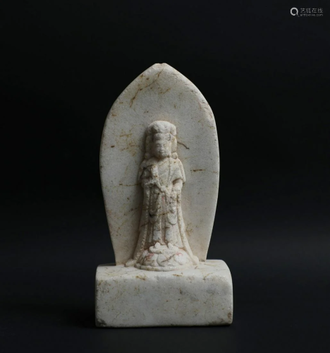 A SMALL STONE BUDDHA STATUE