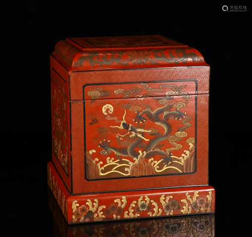 A LACQURED BOX WITH DRAGON DESIGN