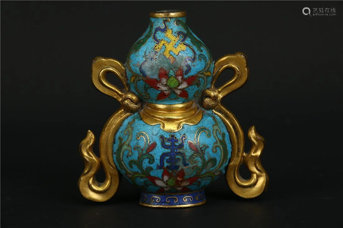 A GILT BRONZE BOTTLE