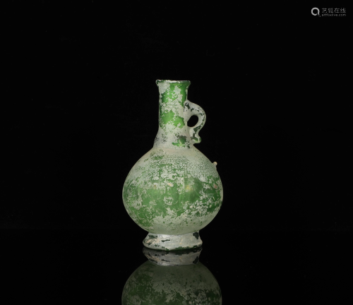 A VINTAGE GLASS VASE