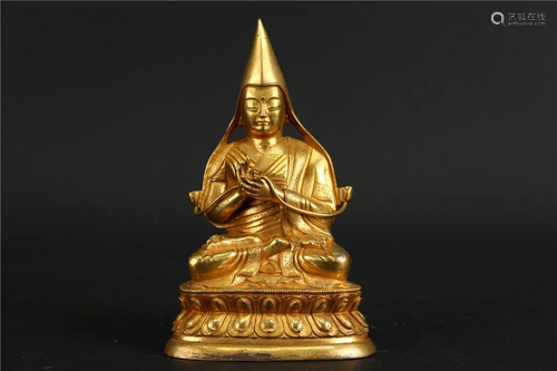 A GILT BRONZE BUDDHIST TSONGKHAPA STATUE