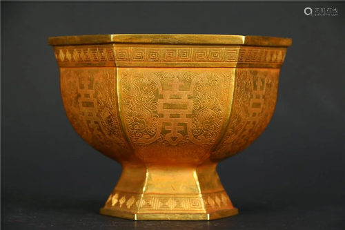 A HIGH-HEEL CUP MADE OF GILT BRONZE