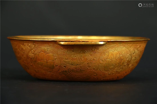 A GILT BRONZE SERVING CUP