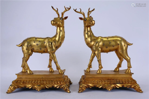 A PAIR OF GILT SILVER DEERS