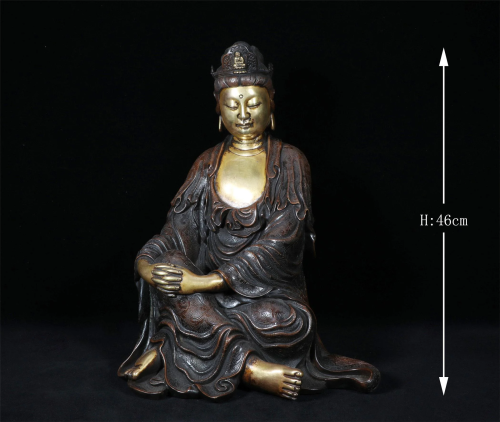 A GILT BRONZE GUAN YIN STATUE