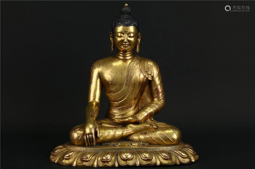 A GILT BRONZE BUDDHIST SAKYAMUNI STATUE