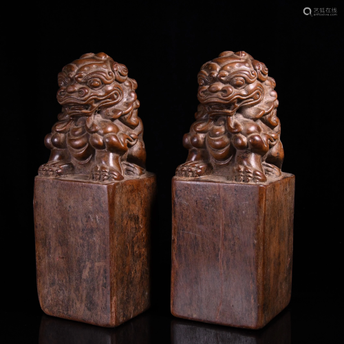 A PAIR OF ZI TAN LIONS