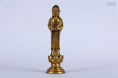 A GILT BRONZE STATUE