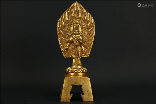 A GILT BRONZE BENCH BUDDHA STATUE