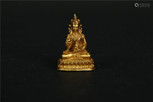 A GILT BRONZE BUDDHA STATUE