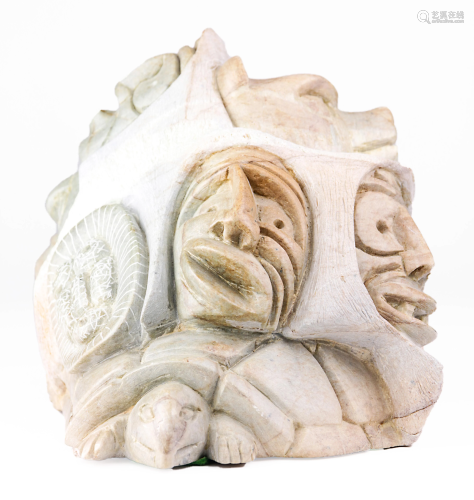 A carved Inuit colored soapstone sculpture