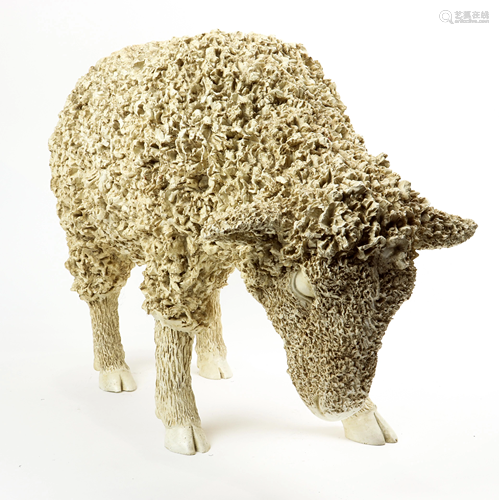 A life-sized figural sculpture of a lamb