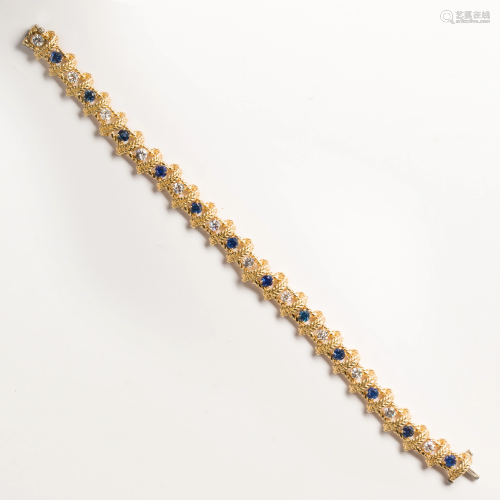 A diamond, sapphire and eighteen karat gold bracelet