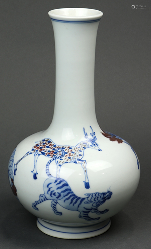 A Chinese iron red, blue and white vase