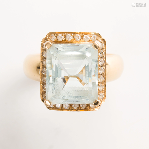 An aquamarine, diamond and eighteen karat gold ring