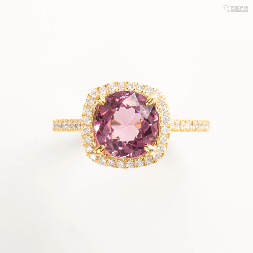 A pink *SPINEL*, diamond and eighteen karat gold ring