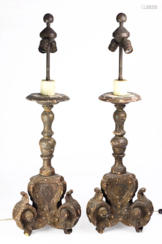 A pair of continental carved and polychrome decorated