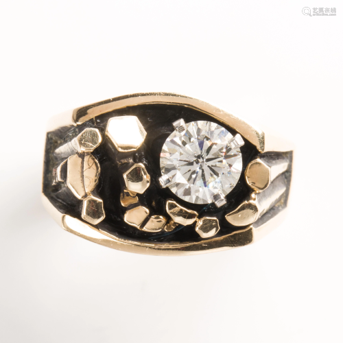 A Modernist diamond and fourteen karat gold ring