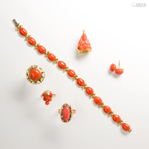 A group of coral and gold jewelry