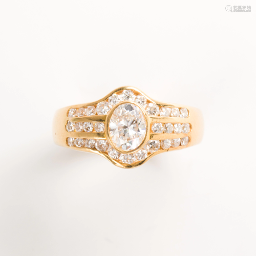 A diamond and eighteen karat gold ring