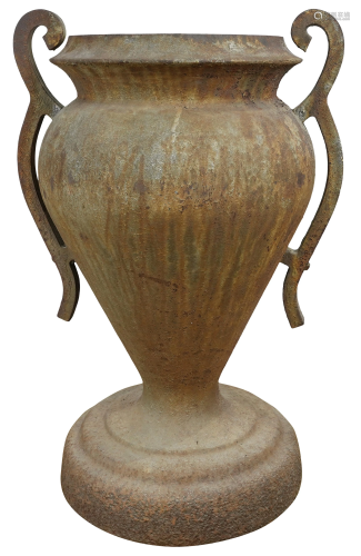 A large iron urn form vessel
