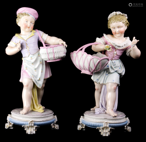 (lot of 2) A group of German porcelain figural groups