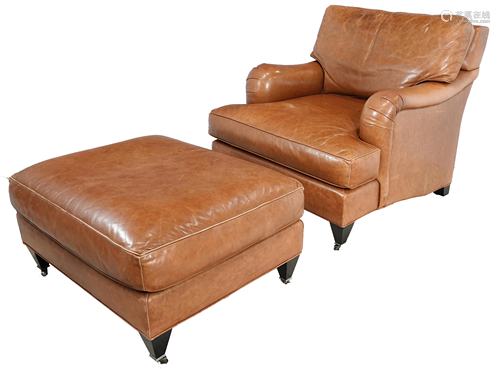 A Coach brown leather armchair and ottoman