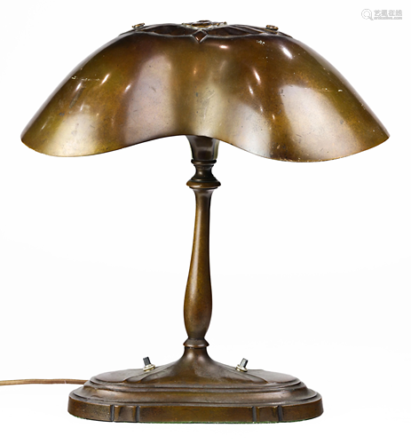 An Art Nouveau patinated bronze table lamp