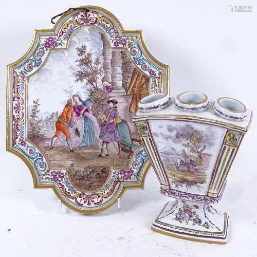 A 19th century French faience hand painted porcelain wall sconce plaque, marked Lille 1767, and a