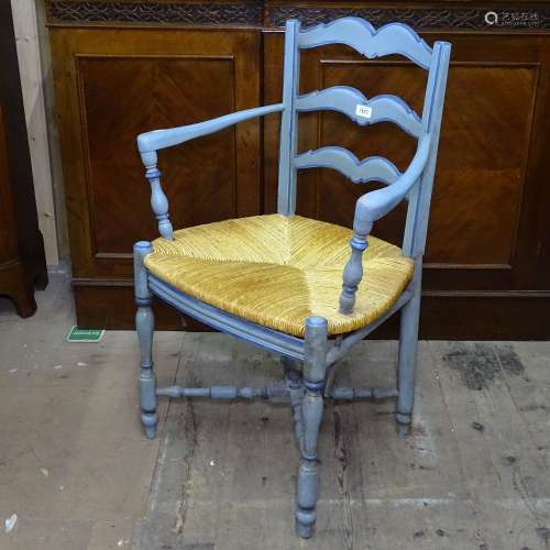 A painted ladder-back and rush-seated Sussex style chair