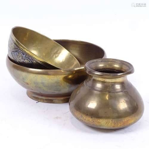 A Middle Eastern silver and copper inlaid brass bowl, brass gourd and a heavy brass pot pourri,