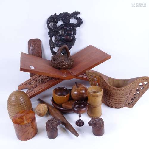 Various carved and turned wood items, including pair of lion head pepperettes, lychee fruit, beehive