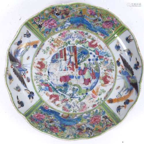 A large Japanese green ground lobed charger, central courtyard scene with phoenix butterfly and