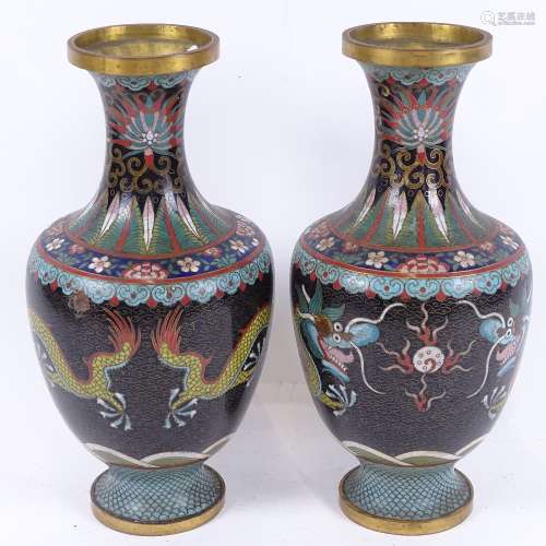 A pair of Chinese black cloisonne enamel brass vases, dragon decoration, height 26cm