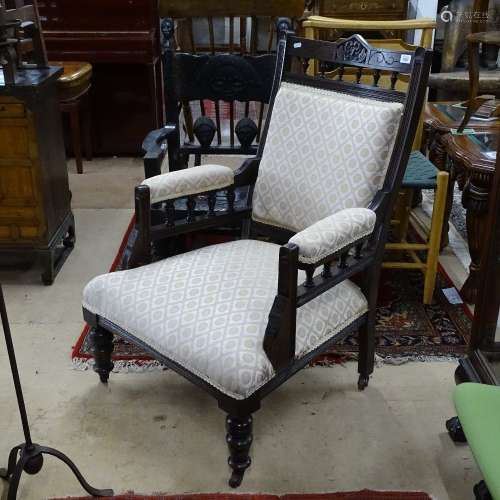 A late Victorian stained and upholstered open-arm parlour armchair