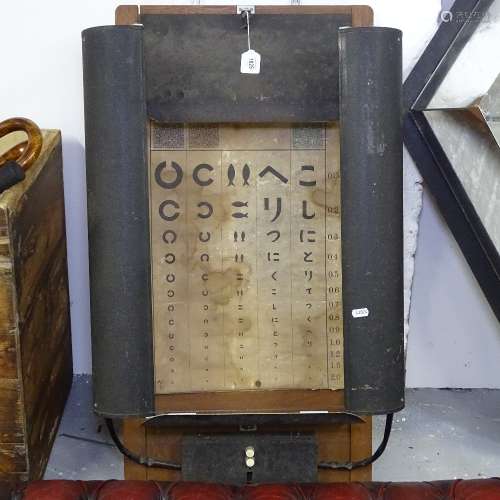 An unusual mid-century optometrist's eye chart with lights