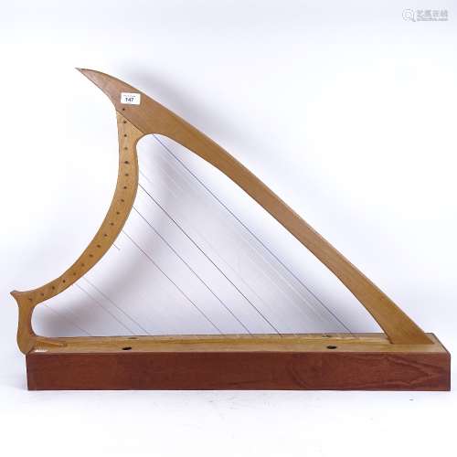 A modern handmade Erin harp, made by Erinstrings Folk Instruments, base length 85cm
