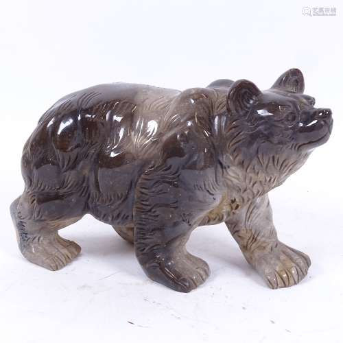 A large grey soapstone grizzly bear figure, length 21cm