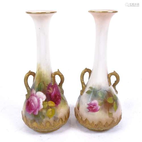 A pair of Royal Worcester narrow-necked vases, model no. 1939, hand painted and gilded floral