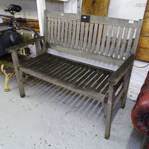A weathered slatted hardwood folding garden bench, W2cm