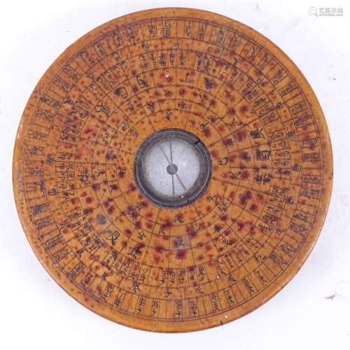 A 20th century Chinese luopan feng shui wood geometric compass, diameter 9.5cm