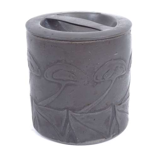 ARCHIBALD KNOX for LIBERTY & CO - an early 20th century Art Nouveau Tudric pewter lidded biscuit